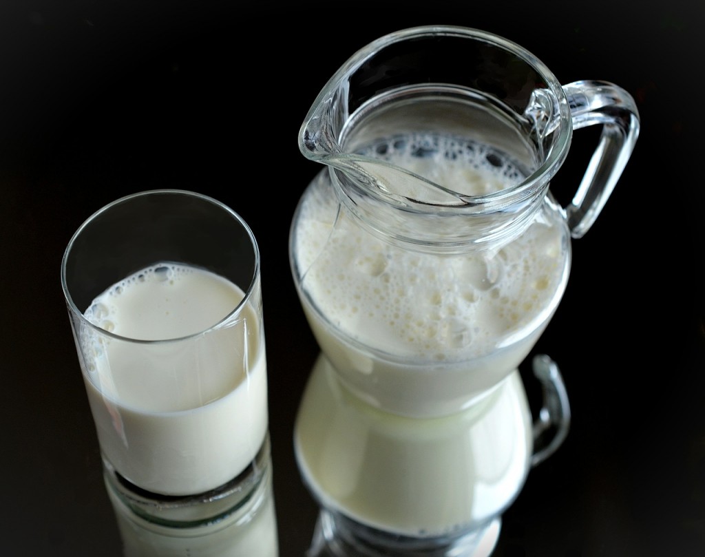 Milk in glass and pitcher